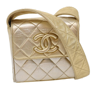 Chanel Gold Leather Travel Bag